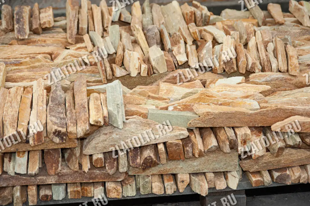 горбушка из жёлтого златолита для облицовки в наличии от производителя